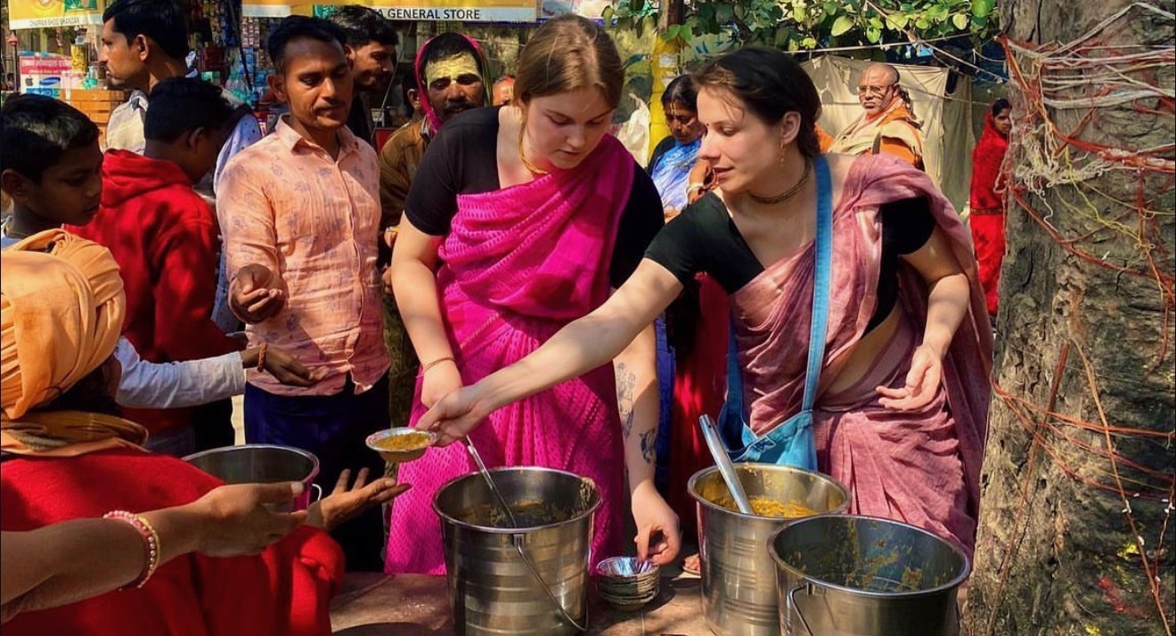 Distributing prasadam to pilgrims on the streets of Vrindavan